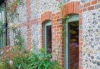 Timber alternative windows used in an old converted grain store